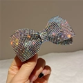Macro shot of an elegant bow hair clip with multi-colored rhinestones on a metal base - Style A Hair Clip / AB Color