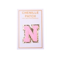 Close-up of pink chenille letter N patch with gold sequins and self-adhesive backing - Letter N