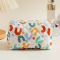 Quilted floral makeup bag with colorful abstract geometric prints and white zipper closure - Colorful U-Pattern