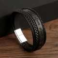 Macro shot of men's black leather braided bracelet with cross-embossed magnetic clasp - 19cm / Black