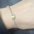 Detail of S925 silver bracelet with yellow gemstone and paperclip chain link - White Gold Plated Natural Citrine