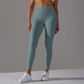 Détail du legging de yoga taille haute avec taille sans couture en tissu vert canard - XS / Vert Mystère