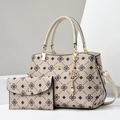 Macro detail of beige printed tote with matching clutch and gold-tone metal hardware - 24*13*19cm / Off White