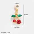 Macro view of cherry charm with red and green rhinestones and dimensions 27x13.5mm - Rhinestone Cherry (61048)