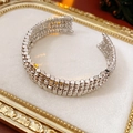 Detailed view of silver multi-row beaded cuff bracelet with metallic woven texture - Silver