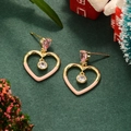 Christmas heart drop earrings with pink zircon on a festive green background - Pink
