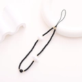 Handmade phone charm with black beads, white flower accents and golden spacers - K1813 Cloud Phone Chain Black