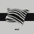 Cute black and white striped knit beanie featuring small cat ears for winter warmth - Black & White Stripes