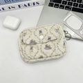 Detailed view of beige quilted floral pouch with cute rabbit print and metal keychain - Lace Purple Rabbit