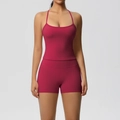 Close-up of wine red yoga set featuring high-waist shorts and a thin strap sports tank top - S / Top And Bottom / Carmine