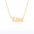 Detail view of the Libra pendant necklace in polished gold with Gothic lettering - Libra (Gold)