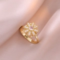 Detail of a gold flower ring with pink gemstones on an elegant pink silk background - Pink Ring / Pink
