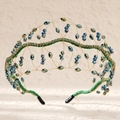 Detailed craftsmanship of gold bridal headband with green and blue crystal bead weaving - Green