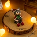 Miniature resin Christmas dog figurine with red hat and candy cane, size 4cm high - Christmas Animal with Candy Style (24号)