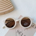 Retro round matte beige sunglasses for kids with UV400 protection and tea-colored lenses - Off White