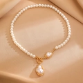 Detailed view of the gold toggle clasp and baroque pearl pendant on the vintage necklace - Gold Toggle Baroque Pearl Pendant Necklace (M-755)