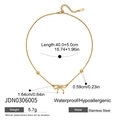 Vista macro che mostra dimensioni e dettagli della collana a farfalla in oro 18 carati - Stile Dolce Fiocco Cuore (JDN0306005)