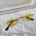 Chic heart-shaped sunglasses with golden metal frames and vibrant yellow lenses - Mini Heart Yellow Lens