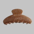 Detail view of a large brown acetate hair claw clip with golden glitter finish - Glitter Light Coffee