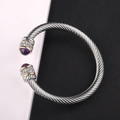 Silver cable cuff bracelet with purple natural stone and gold accents on a duo background - Purple Gemstone / Silver Cable