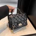 Classic black quilted crossbody bag with gold chain strap and metal lock closure - Black