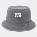 Detail of grey washed denim bucket hat featuring vintage Brooklyn woven patch and eyelets - One Size / Gray