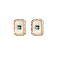 Detail view of rectangular white shell earrings with emerald center and zircon halo - Square Green Zirconia Earrings