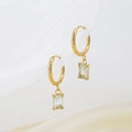 Gold hoop earrings with square light blue zircon pendants in a minimalist summer style - Light Blue