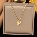 Elegant gold oval pendant necklace with baroque pearl on a stylish beaded chain link - Pearl Oval / Gold