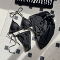 Three-piece black bikini set with textured seersucker fabric and matching sarong skirt - S / Black