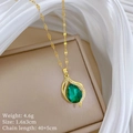 Detailed view of water drop pendant with green gemstone, weight 4.6g and size 1.6x3cm - Waterdrop Green Gemstone Style (F503)