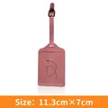Pink PU leather luggage tag featuring a gold heart airplane print and adjustable strap - Pink