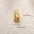 Detailed view of a gold-plated shell charm with size 13.6x6.2mm and 0.4g weight specifications - A0568 Shell