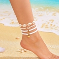 Detail of bohemian gold layered anklet with starfish and seashell charms on a beach - Shell Polymer Clay 4-Piece Set