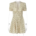 Detail of V-neckline and bow tie on a cream floral summer dress with short sleeves - S / Yellow