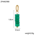 Detailed view of green cylindrical bead pendant with gold accents and size markings - Green
