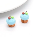 Pair of blue resin cupcake charms with brown bases for DIY jewelry and crafts - D297 Blue (Cupcake)