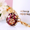 Deep purple money bag keychain with golden character and sparkling crystal accents - Round Purple Fortune Bag