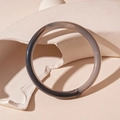 Minimalist smoky grey acrylic geometric bangle featuring unique ink-style marble patterns - Gray