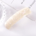 Close-up of rectangle spring hair clip in pearlescent cream acetate with shell texture - 31# Spring Clip (Holographic Pearl White)