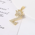 Macro shot of gold-plated Z-letter pendant with crown detail and pavé-set cubic zirconia - Letter Z