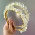 Close-up of double-layer golden wire headband with raw clear crystal stones - Lemon Quartz Gold Wire Gold Headband