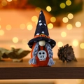 Halloween gnome doll with black star wizard hat and white skull on orange fabric body - Skull Alien