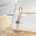 Silver cross earring with grey zircon heart detail and dimensions of 2.97x1.05 cm - Cross Dangle (Single)