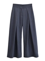 Detalle de los pantalones de talle alto y pierna ancha azul marino con finas rayas verticales - XS / Rayas verticales azul oscuro
