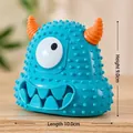 Blue monster dog toy with orange horns and squeaky texture measures 10cm by 9cm - Monster Style / Blue