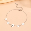 Silver S925 sterling silver daisy anklet with five small flower charms on pink fabric - Silver Daisy Anklet (Q303)