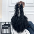 Trendy heart-shaped faux fur crossbody bag in fluffy black finish for women - Black