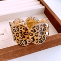 Irregular leopard print resin wide bangle with gold hinge in a velvet jewelry box - Orange Leopard Metal Hardware Style (47# Bangle - Orange)