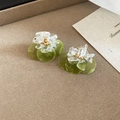 Close-up of handmade green shell stud earrings with clear resin stone flower detail. - Style 11 / Silver Earring Post-Green